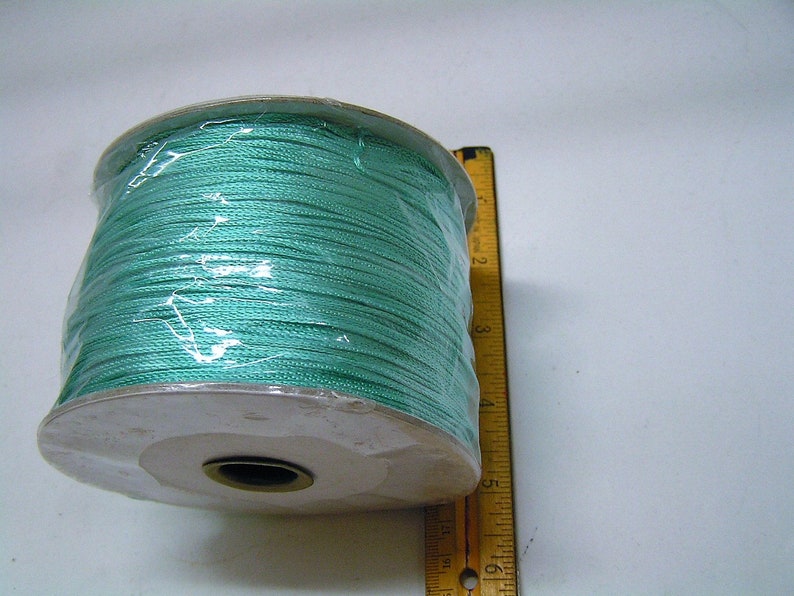 approx. 890 yds Aqua Blue Colored Beautiful Vibrant Chainette yarn on 12 lb spools
