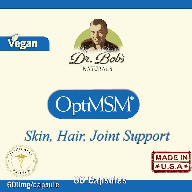 May include: A blue and white label with the text "Dr. Bob's Naturals OptiMSM Skin, Hair, Joint Support 600mg/capsule 60 Capsules" and a picture of a man with a white beard. The label also has a green leaf with the word "Vegan" on it and a red stamp that says "Made in U.S.A."