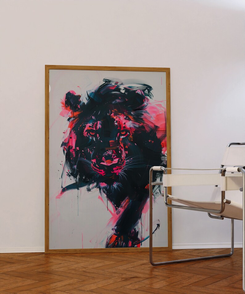 May include: A framed abstract painting of a lion's head in black, pink, and white. The lion's face is in focus, with the rest of the painting blurred.