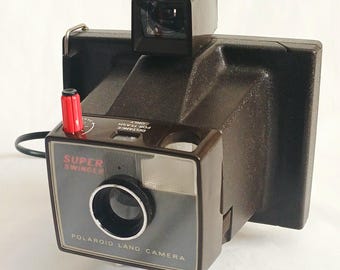 Vintage 1970s Polaroid Super Swinger Instant Camera, with Paperwork, Original Receipt, Spare Bulbs and (Damaged) Carry Case - UNTESTED