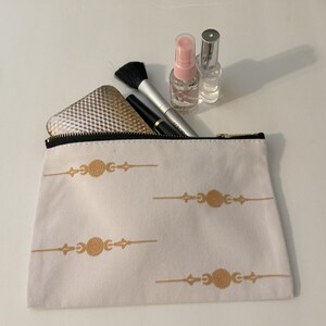 Harmony: White Cotton Canvas Pouch with Golden Ornamental Designs