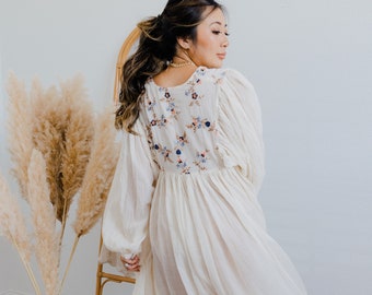 vacation leisure silk-cotton embroidery dress Light, breathable, and perfect for getaways this cotton vacation one-piece dress keeps you cool and comfortable while giving an effortless, chic look. Ideal for beach days, travel, and casual