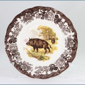 Op de afbeelding: Een set van drie keramische nestkommen in blauwe, groene en witte tinten. De kommen hebben een gespikkelde glazuur en een eenvoudig, modern ontwerp. De grootste kom heeft een diameter van ongeveer 15 cm.