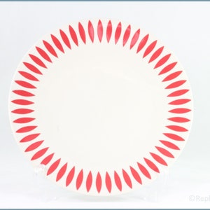 May include: White ceramic dinner plate with a red, stylised leaf pattern around the edge.