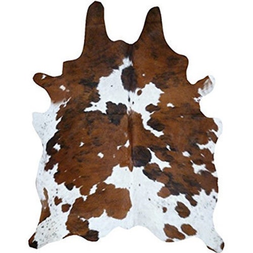 ブラウンとホワイトの牛革ラグ 斑点模様の牛革ラグ 本物の牛革ラグ 毛