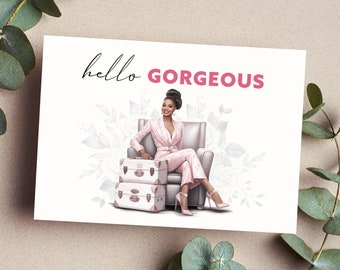 May include: A greeting card with the text "hello gorgeous" in black and pink lettering. The card features a digital illustration of a woman in a pink suit sitting in a chair with two suitcases beside her. The background is a white watercolor design with gray leaves.