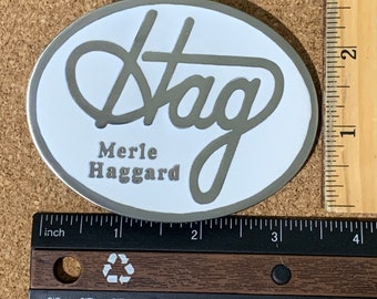 Merle Haggard the Great « Hag » Belt Buckle Durable WHITE Émaillé 3,5 pouces