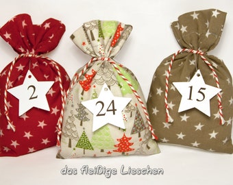 24 Advent kalender zakken zakken sterren rode beige spar spar sparren