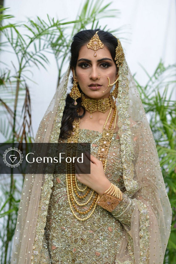 green emerald velvet dress Traditional Pakistani Bridal Dress in Golden Maxi Style Online – Nameera by  Farooq