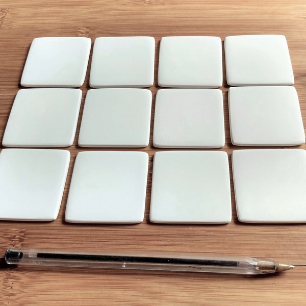 12 square 4cm tile ceramic blanks. For painting/decoupage/etc 'cold finish' or pottery kiln glaze firing. Super white earthenware ceramic.