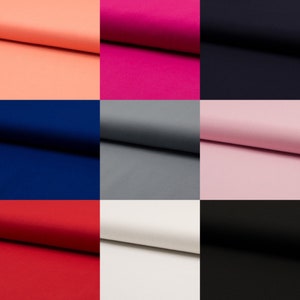 Könnte beinhalten: Eine Sammlung von Stoffproben in verschiedenen Farben, darunter Koralle, Rosa, Marineblau, Grau, Hellrosa, Rot, Weiß und Schwarz. Der Stoff ist gefaltet und in einem Raster angeordnet.