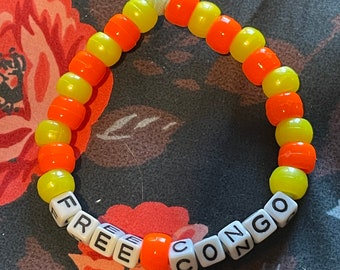 yellow and orange “free Congo” kandi/pony bead rave bracelet - 100% of proceeds donated!!