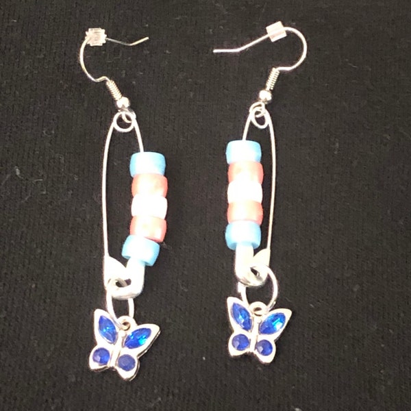 trans flag & navy blue butterfly safety pin earrings!! :)