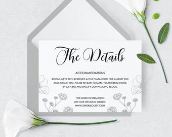 May include: A white card with black text that reads "The Details" and provides information about accommodations at the Plaza Hotel for a wedding. The text also includes a website address for more information: www.derekacasey.com.