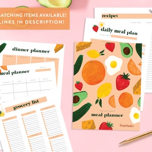 May include: A set of printable meal planner pages with a colorful fruit and vegetable design. The pages include a daily meal plan, a dinner planner, a meal planner, and a grocery list. The text "The Ultimate Meal Planner" is printed on the cover page.