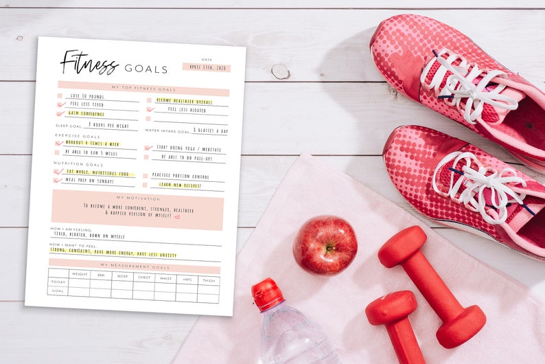 May include: A printable fitness goals worksheet with a pink and yellow color scheme. The worksheet includes sections for top fitness goals, sleep goals, exercise goals, nutrition goals, motivation, and a measurement scale. The worksheet is surrounded by fitness-related items, including pink running shoes, red dumbbells, a red apple, and a clear water bottle.