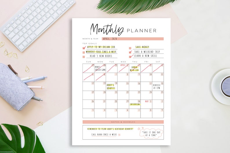 May include: A printable monthly planner with a pink and black color scheme. The planner includes a calendar for April 2024, a section for top goals, and a notes and doodles section. The top goals include "Apply to my dream job", "Workout four times a week", "Read 3 new books", "Save money", "Take a weekend trip", and "Learn a new skill".