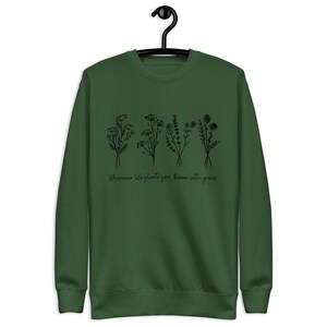 Wherever life plants you, bloom with grace. Unisex Premium Sweatshirt