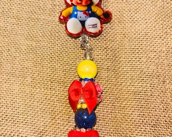 Rotolo porta badge a forma di scimmietta marrone