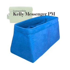 May include: A vibrant blue bag organiser with the text "Compatible Kelly Messenger PM" in black. The organiser is rectangular with a wide opening and several interior pockets. A light green bag is visible in the background.