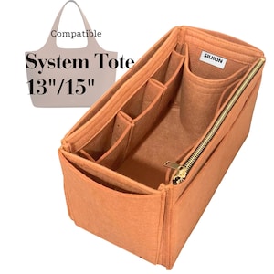 May include: A rectangular orange felt bag organiser with multiple interior compartments, a side zip, and a white label reading SILKON. The graphic above displays a tote silhouette with the text Compatible System Tote 13"/15".