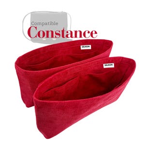 May include: Two red fabric bag organizers with multiple pockets. The organizers are labeled "SILKON" and are designed to be compatible with a "Constance" bag. The organizers are made of a soft, textured material.
