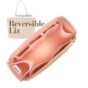 May include: A pink felt bag organiser with multiple compartments and a gold zip. The organiser is designed to fit inside a Reversible Liz tote bag, as indicated by the text "Compatible Reversible Liz". The brand name "SILKON" is visible on a label.