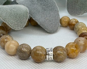 Yellow Jasper Beaded Stretch Bracelet with a Silver Spacer. Optimism, Vitality, Protection.