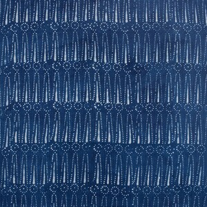 May include: A blue fabric with a white pattern of small circles and vertical lines. The pattern is repeated throughout the fabric.