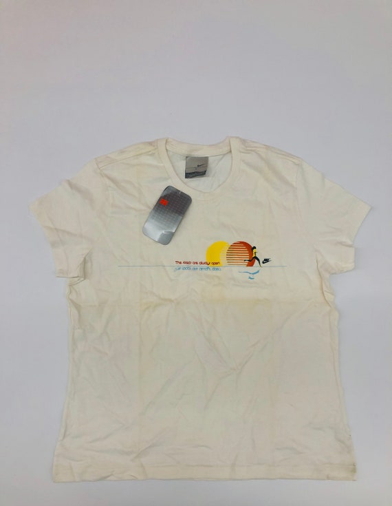 nike white and orange shirt