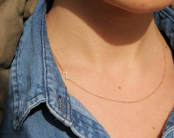 Collar de letras de plata con piedras