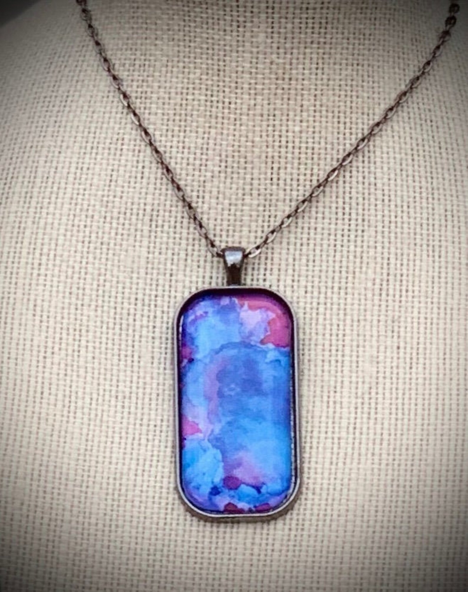 Wearable art necklace featuring abstract ink painting set in Etsy