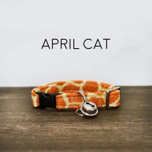 April Cat Collar - Giraffe Print Breakaway Collar with Bell, Orange and Yellow Animal Print, Made in the USA