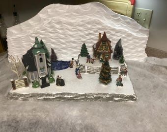 Christmas village  display platform with pond , creek and accents rocks and trees