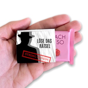 Children&#39;s birthday detective chocolate bands with a secret message