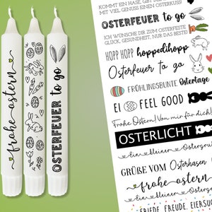 Może przedstawiać: Trzy białe świece z czarno-białymi ilustracjami królików, jajek i marchewek. Świece mają nadrukowany tekst "Frohe Ostern", "Osterfeuer to go" i "Osterfeuer to go".