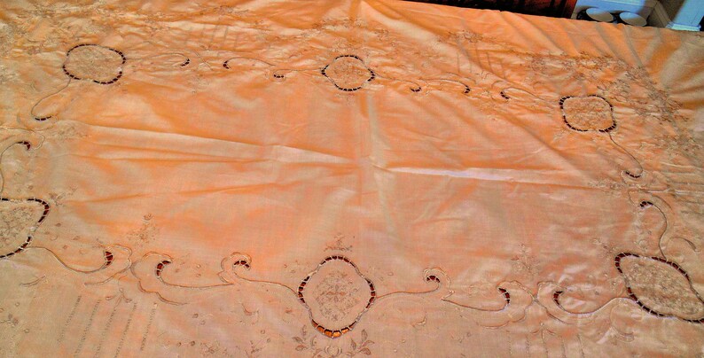 Beautiful Oval Tablecloth Lite Cream With Lots of Lite Taupe Colored Embroidery...Scalloped Edge