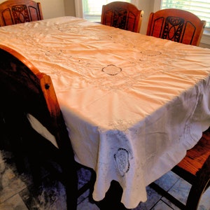 Beautiful Oval Tablecloth Lite Cream With Lots of Lite Taupe Colored Embroidery...Scalloped Edge