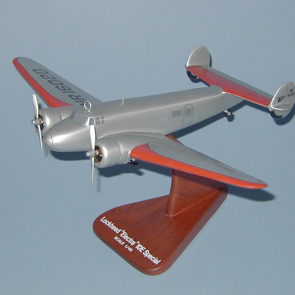 Réplica de madera de caoba tallada a mano del modelo de avión Lockheed L-10 Electra usado por Amelia Earhart para exhibición de escritorio