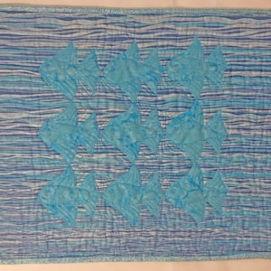 Quilt - Fish Tesselations - Light Blue Fish on Waves,  small quilt.