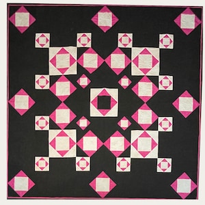 May include: A black and white quilt with a pink diamond pattern. The quilt is made up of many small squares, each with a different design. The quilt is a traditional design and would be a great addition to any home.