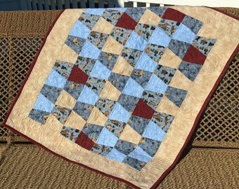 QUILT -  Holiday Baby Quilt in "winter colors" featuring a super soft fleece back, 35" X 41", Machine Washable