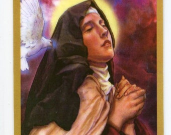 May include: A painting of a woman in a black and white habit with her hands clasped in prayer. A white dove with outstretched wings is flying above her head. The background is a purple and pink sky with a halo of light around the woman's head.
