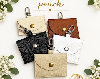 Pochette porte-alliances pour transporter les alliances. Se fixe au collier ou au harnais du chien.