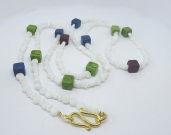 Long white chain with colorful cubes of semi-precious stones