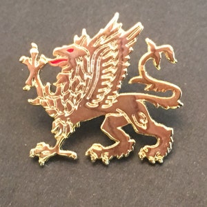 Cold coloured Griffin lapel pin badge
