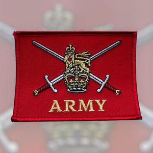 May include: A red embroidered patch featuring a gold crown and crossed swords. The words "ARMY" are embroidered in gold below the crown.