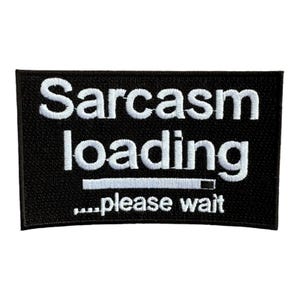 May include: Black and white embroidered patch with the text "Sarcasm loading... please wait".