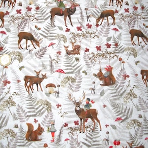 May include: A white fabric featuring a repeating pattern of brown deer, squirrels, and small figures in green clothing, interspersed with grey fern leaves, brown mushrooms, and red berries, with a circular coin visible for scale.