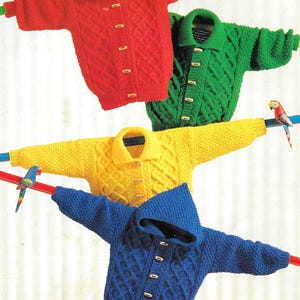 May include: Four knitted cardigans in different colors: red, green, yellow, and blue. Each cardigan has a cable knit pattern and button closure.